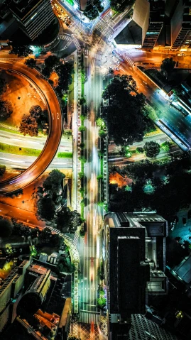 an aerial view of a city at night, by Josh Bayer, unsplash contest winner, digital art, traffic lights, south jakarta, taken on an iphone, flat curves