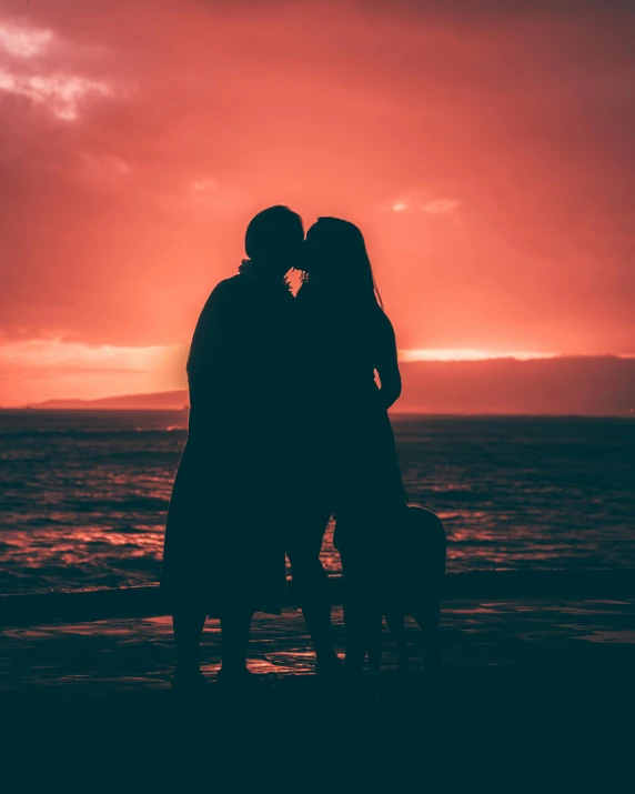 a couple kissing on the beach at sunset, by Julia Pishtar, pexels contest winner, lgbt, the sky is red, transparent background, ( ( ( ( kauai ) ) ) )