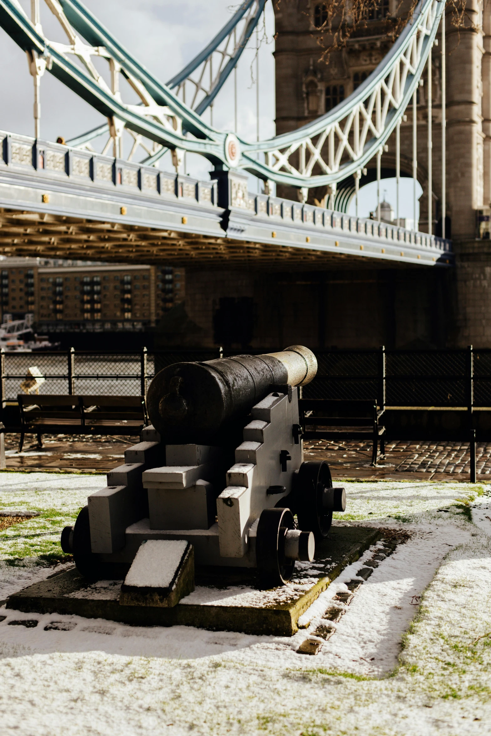 a cannon on display in front of a bridge, inspired by Thomas Struth, pexels contest winner, highly detailed model, hull, [ 4 k photorealism ], exterior