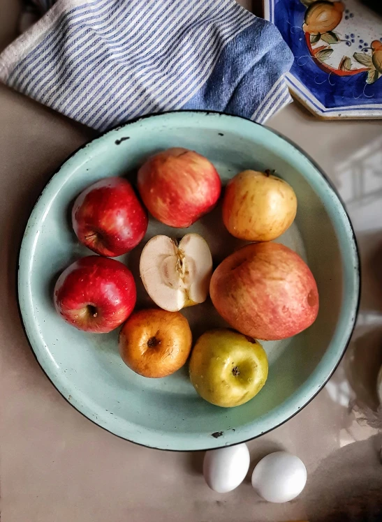 a bowl of apples and eggs on a table, inspired by Paul Cézanne, unsplash, renaissance, 2 5 6 x 2 5 6 pixels, candy apple, 6 pack, crisp colors