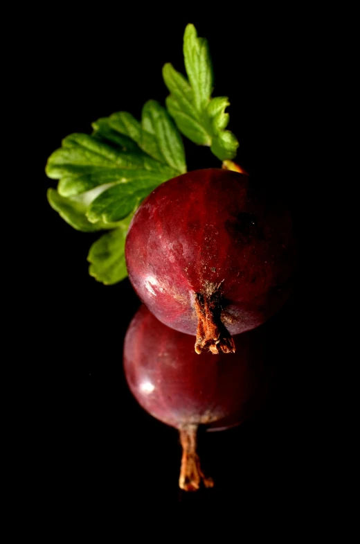 a bunch of grapes sitting on top of each other, a digital rendering, unsplash, obsidian pomegranade, square, against a deep black background, close - up photograph