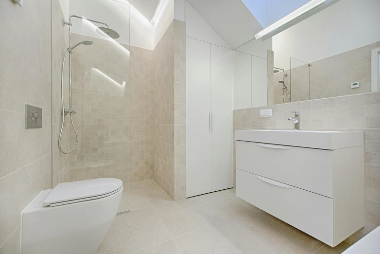 a bath room with a toilet a sink and a mirror, a photo, pexels contest winner, light and space, white, panels, angled, tiled