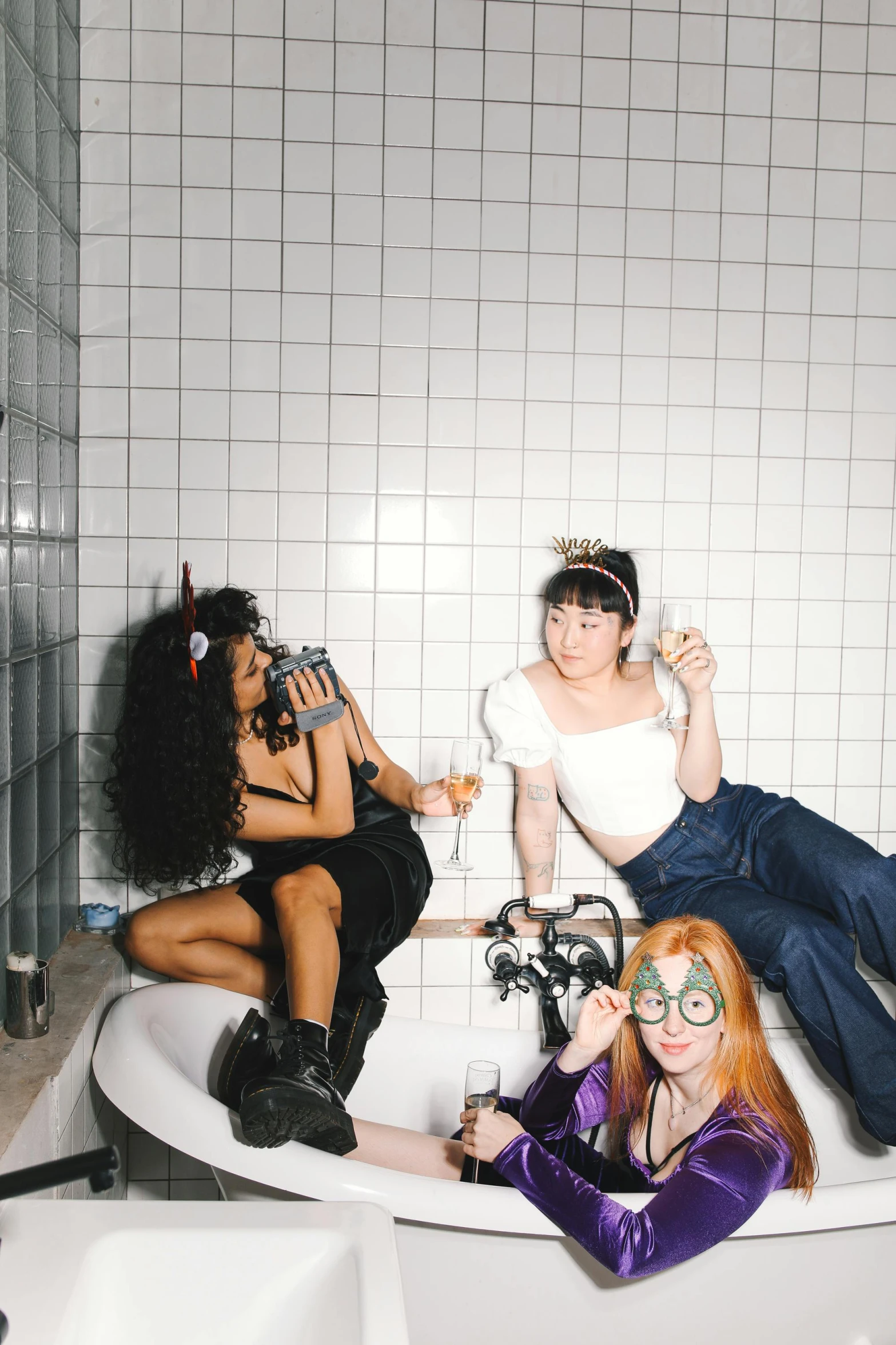 a group of women sitting on top of a bath tub, inspired by Nan Goldin, trending on pexels, renaissance, goblins partying at a rave, three cats drinking in a bar, in style of ren hang, siting on a toilet