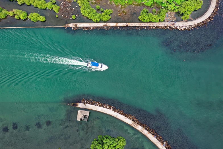 a boat in the middle of a body of water, a digital rendering, pexels contest winner, hawaii, canal, high angle uhd 8 k, thumbnail