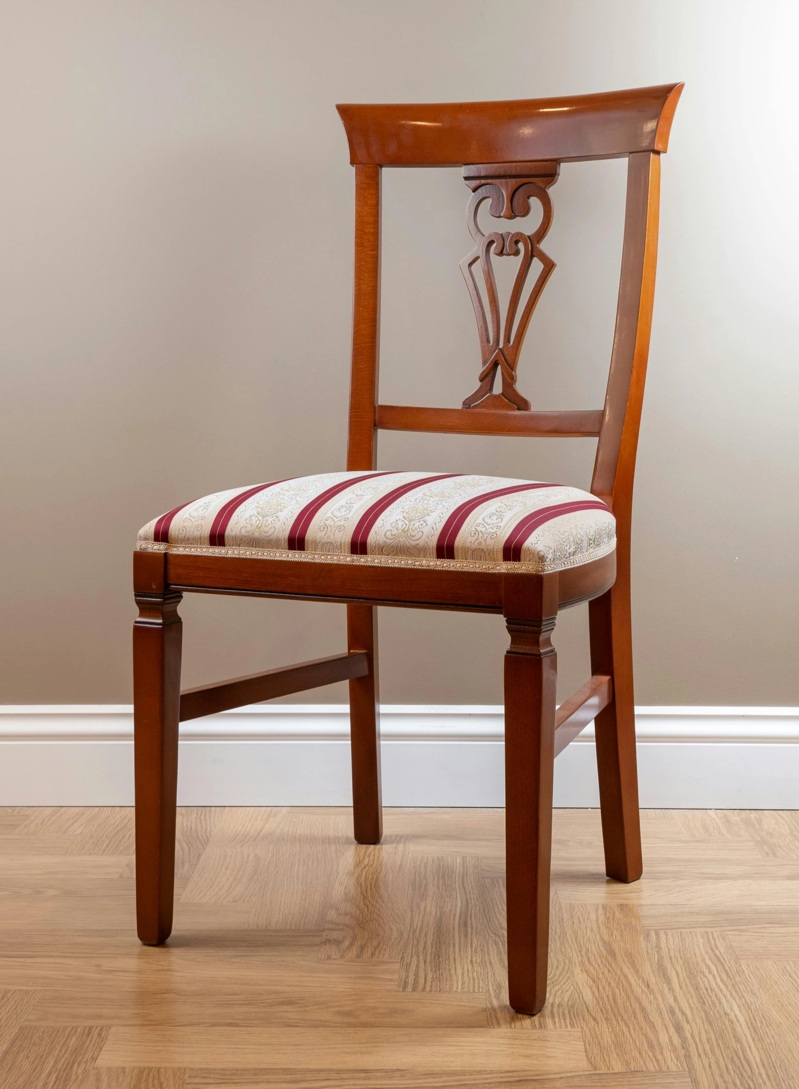 a wooden chair sitting on top of a hard wood floor, by Maria Johanna Görtz, neoclassicism, mahogany wood, directoire style, piano, restored