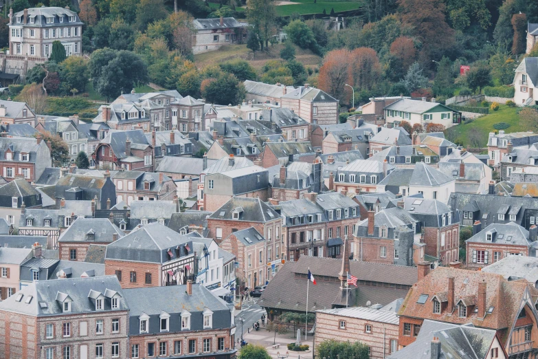 a view of a city from the top of a hill, by Raphaël Collin, pexels, art nouveau, normandy, french village exterior, 2 0 0 0's photo, close-up from above