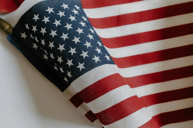 a close up of an american flag on a table, profile image, vista view, zoomed in, fan favorite