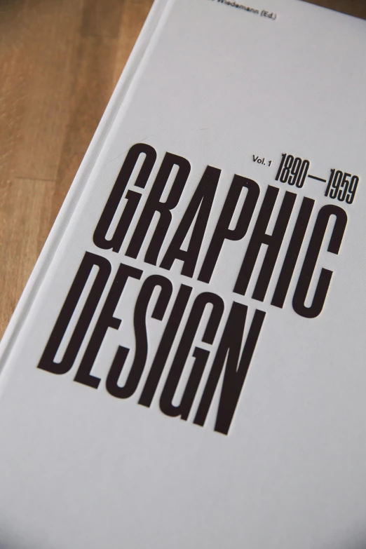 a book sitting on top of a wooden table, computer graphics, behance, international typographic style, from 1985, infographics. logo, graphite, thumbnail