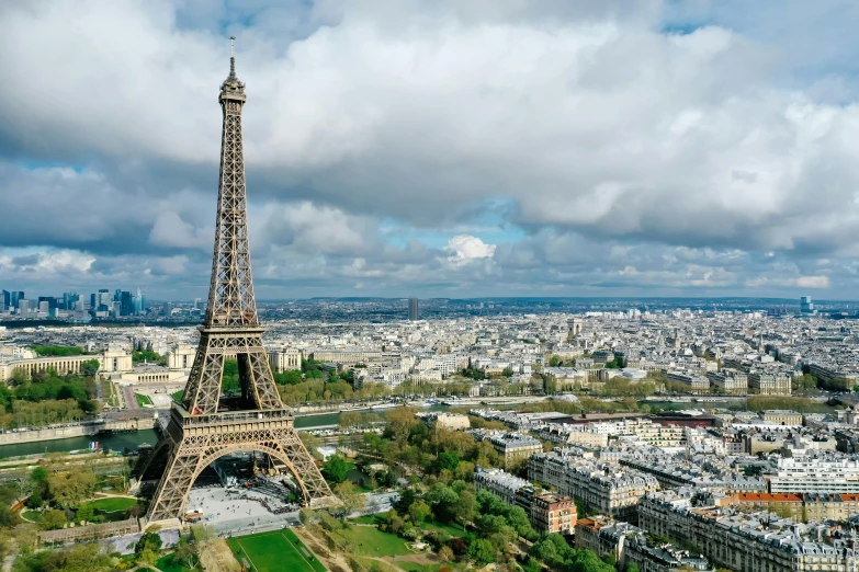 the eiffel tower towering over the city of paris, pexels contest winner, art nouveau, 2022 photograph, wide high angle view, petite, brown