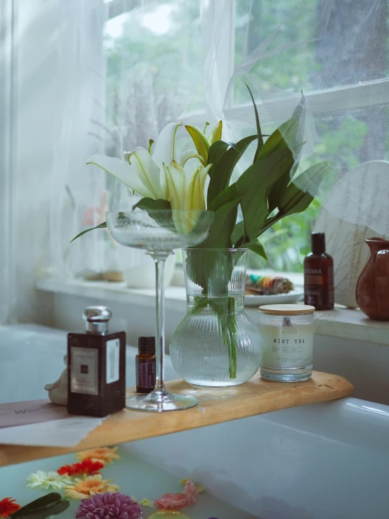 a bath tub filled with flowers next to a window, a still life, inspired by Allan Ramsay, unsplash, lily flower, products shot, 4 k photo autochrome, apothecary