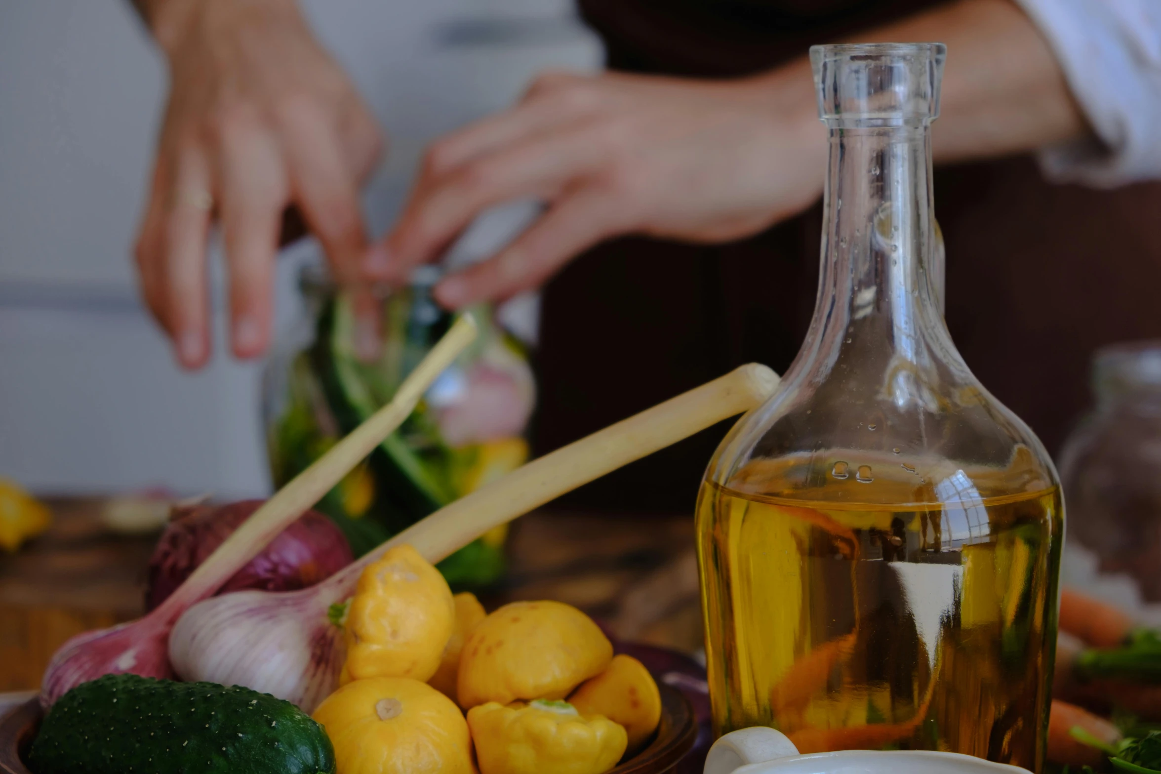 a close up of a person preparing food on a table, oils, fan favorite, olive oil, potions