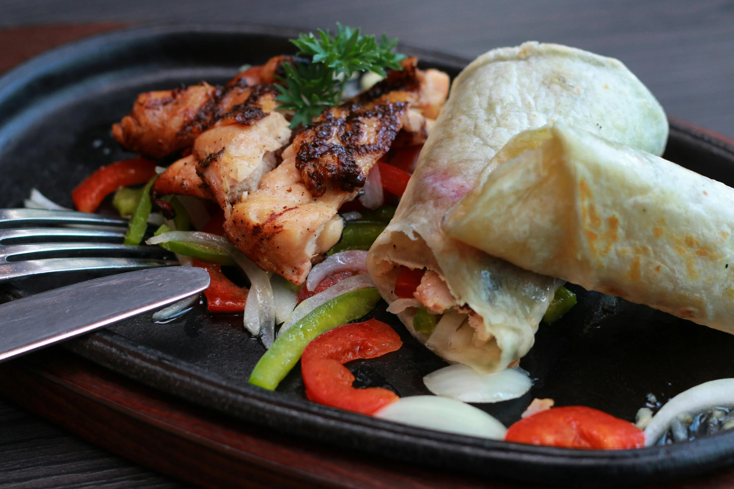 a close up of a plate of food with a fork, pexels contest winner, hurufiyya, cloth wraps, grilled chicken, daily specials, caulfield