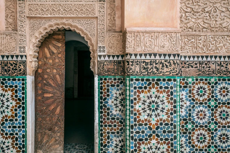 a close up of a doorway in a building, a mosaic, trending on unsplash, arabesque, moroccan tile archways, conde nast traveler photo, multiple stories