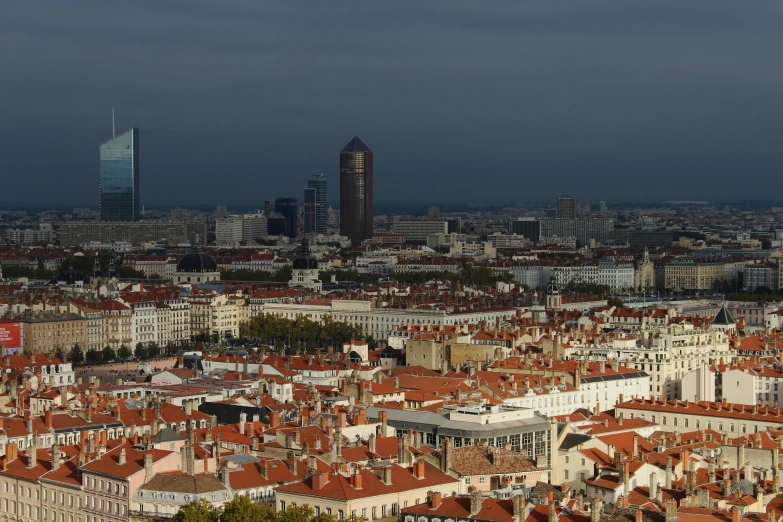 a view of a city from the top of a hill, by Tom Wänerstrand, pexels contest winner, art nouveau, france, square, afternoon light, skyline view from a rooftop