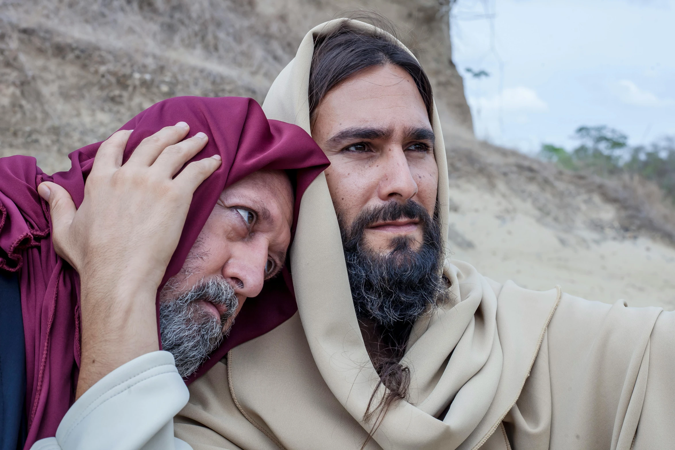 a couple of men standing next to each other, unsplash, renaissance, dressed like jesus christ, avatar image, actor, close - up photograph