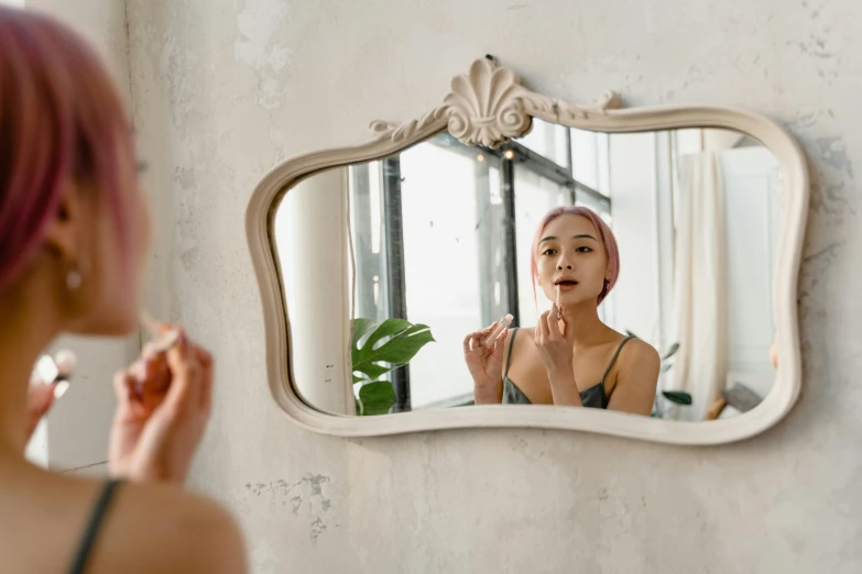 a woman brushing her teeth in front of a mirror, trending on pexels, rococo, lips, ad image, girl with pearl earring, in small room