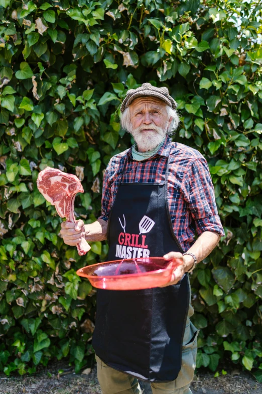 a man standing in front of a bush holding a piece of meat, overalls and a white beard, dripping bbq sauce, art masterpice, in an apron covered in blood