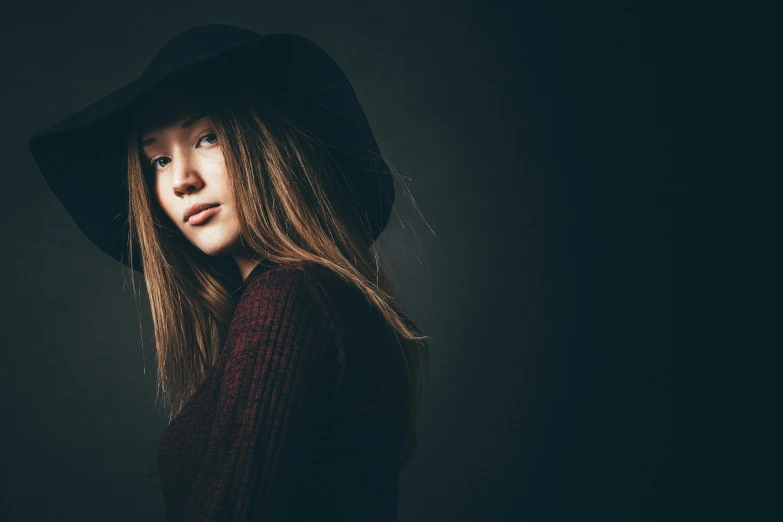 a woman with long hair wearing a black hat, a character portrait, by Adam Marczyński, unsplash, mackenzie foy, eleanor tomlinson, studio lighting 5 0 mm, teenager