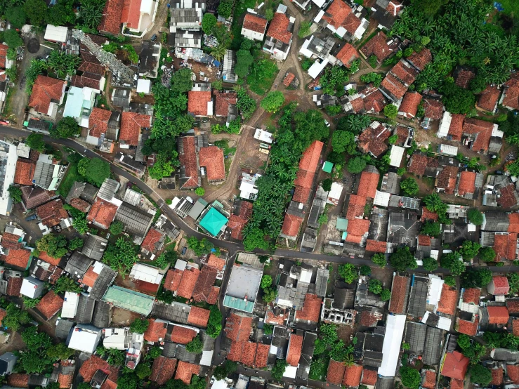 an aerial view of a city with lots of buildings, an album cover, by Daniel Lieske, pexels contest winner, kerala village, south jakarta, square, image dataset