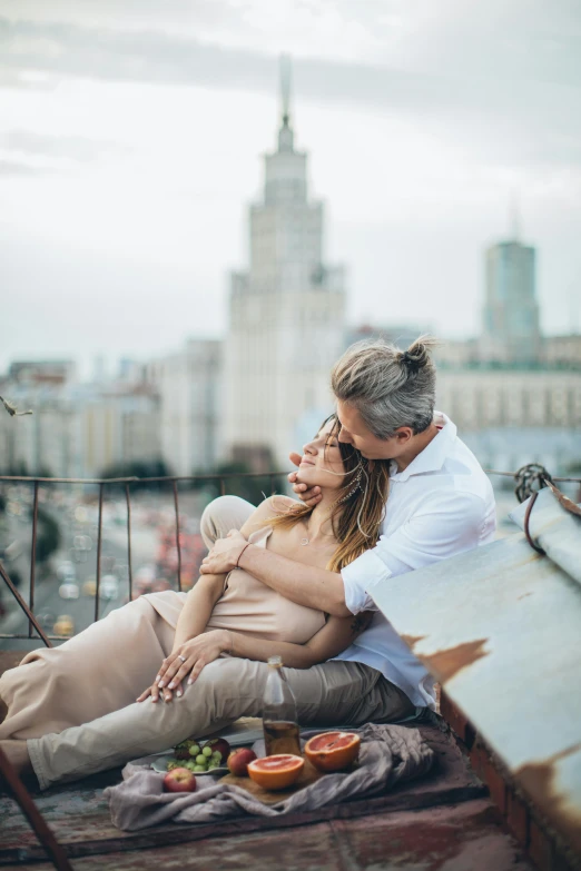 a man and woman sitting on top of a roof, pexels contest winner, romanticism, in moscow centre, cuddling, 15081959 21121991 01012000 4k, instagram post