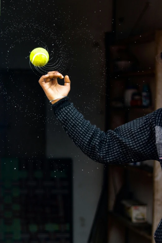 a man throwing a tennis ball in the air, by Jan Tengnagel, unsplash, kinetic art, 15081959 21121991 01012000 4k