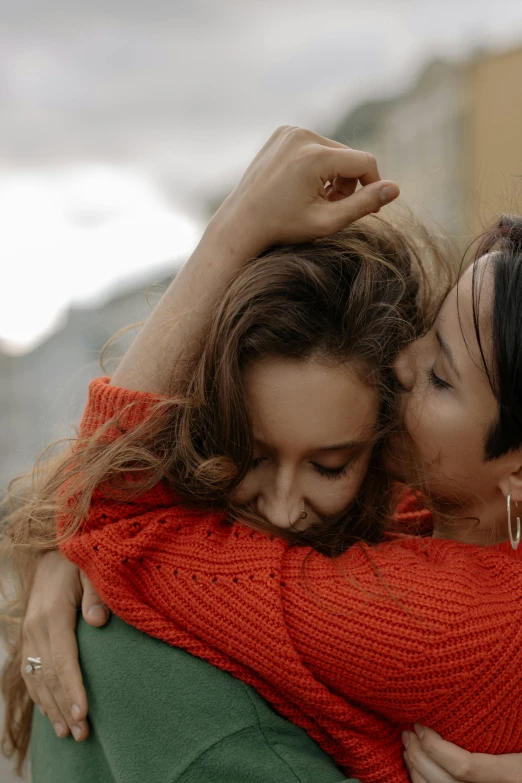 a couple of women that are hugging each other, trending on pexels, film still promotional image, male and female, pokimane, digital image