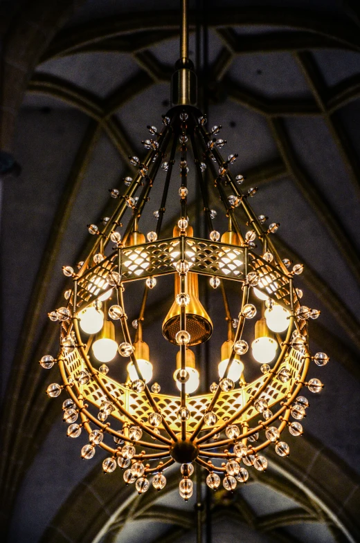 a chandelier hanging from the ceiling of a church, by Konrad Witz, golden dappled lighting, filigree, comfy lighting, with an intricate