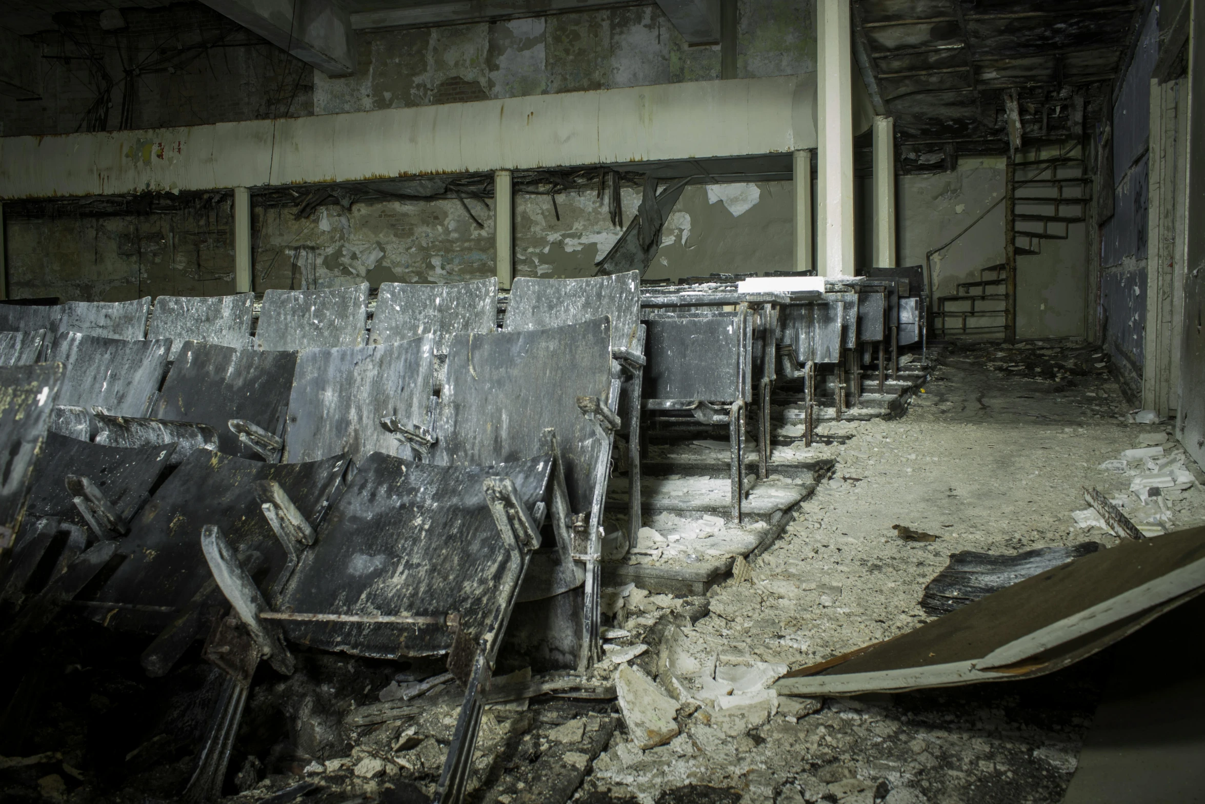 a room that has a bunch of chairs in it, by Elsa Bleda, unsplash contest winner, ashcan school, nuclear aftermath, benches, promo image, in the ruins of london