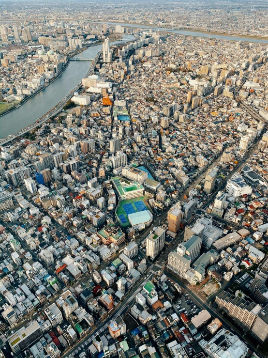 an aerial view of a city with a river running through it, by Yasushi Sugiyama, 2022 photograph, 8 k image