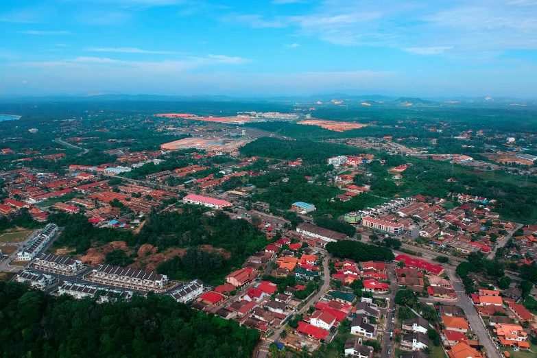 an aerial view of a town surrounded by trees, by Basuki Abdullah, shutterstock, hurufiyya, malaysia jungle, square, terracotta, clean 4 k