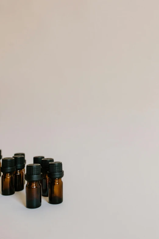 a group of bottles sitting on top of a table, unsplash, manuka, quack medicine, low quality photo, thumbnail