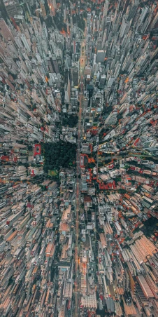 an aerial view of a city with lots of tall buildings, an album cover, by Luis Miranda, pexels contest winner, mapbox, 8k detail post processing, sao paulo in the year 2 0 7 0, hong kong