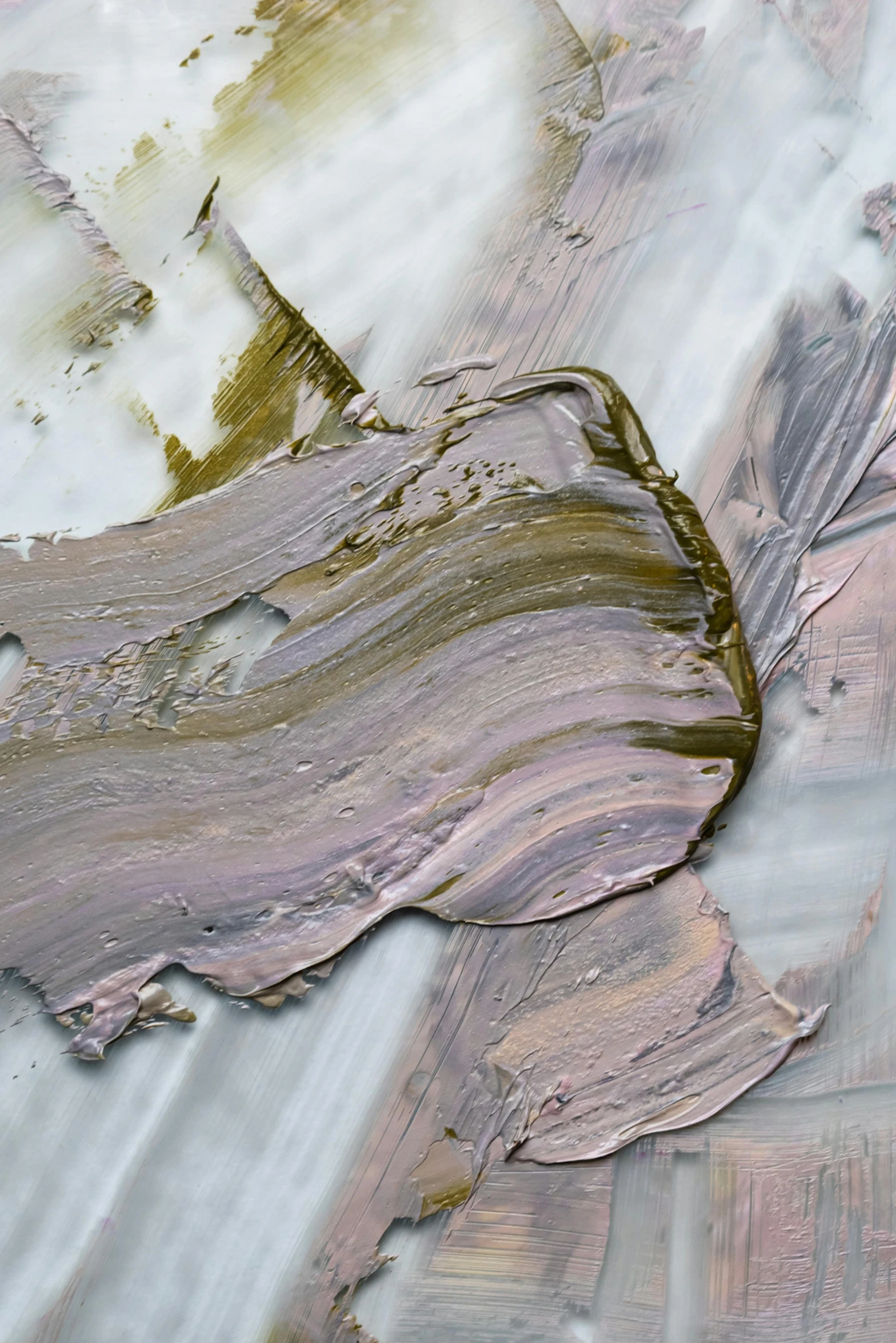 a close up of a painting on a table, an ultrafine detailed painting, inspired by Julian Schnabel, trending on pexels, rotting clay skin, random metallic colors, pastelwave, brown