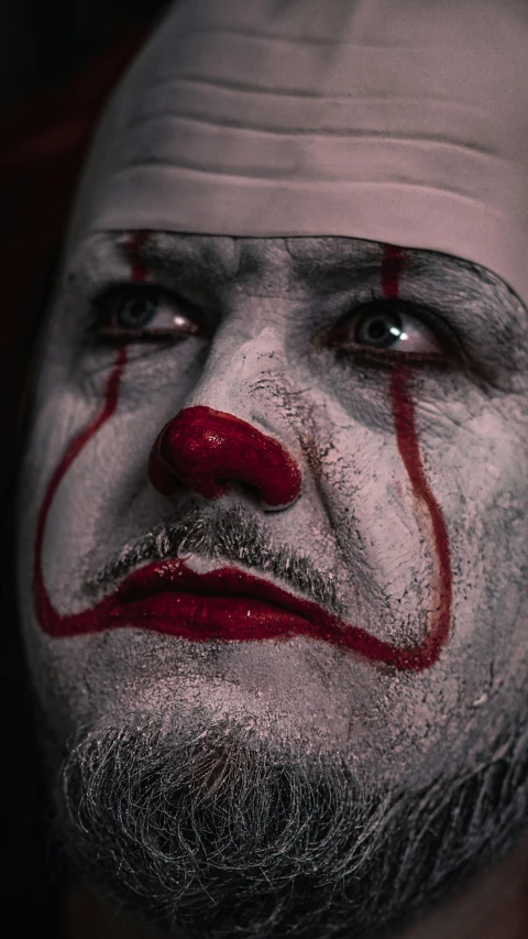 a close up of a person with a clown makeup on, an album cover, inspired by James Bolivar Manson, trending on pexels, lowbrow, pennywise, sadness, ( ( theatrical ) ), actor