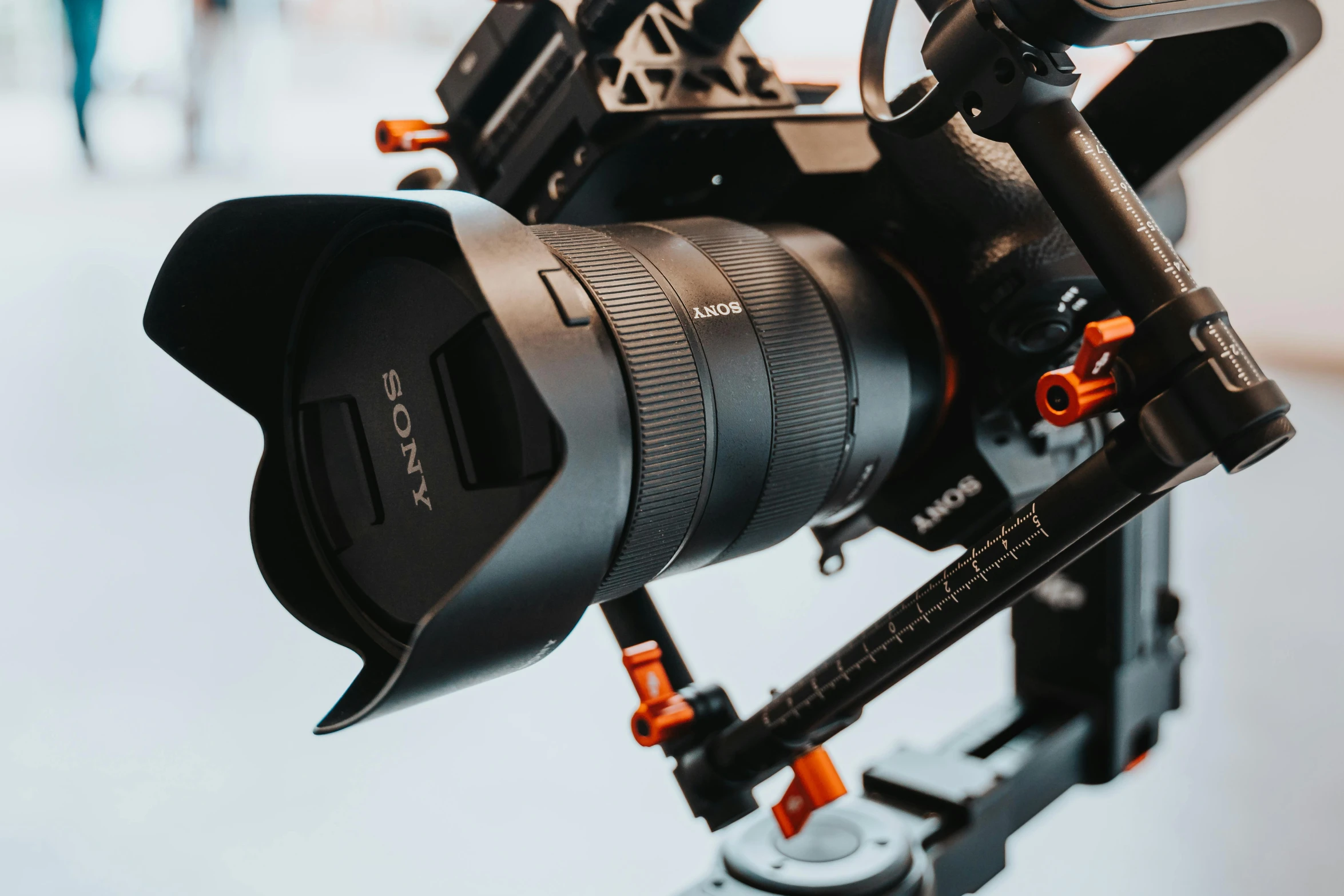 a close up of a camera on a tripod, shot on anamorphic lenses, sony a 7 r 3, sony a7, wide angle”