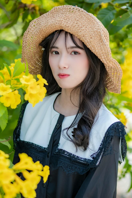 a woman standing in front of a bunch of yellow flowers, inspired by Sim Sa-jeong, realism, wearing a straw hat and overalls, iu, square, ethnicity : japanese