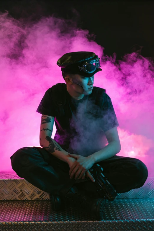 a man sitting on the ground with a gun in his hand, an album cover, unsplash, visual art, an epic non - binary model, smoke fills the room, berets, crown of (pink lasers)