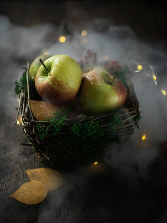 a basket filled with apples sitting on top of a table, inspired by Elsa Bleda, pexels contest winner, fog mist smoke, hansel and gretel, dramatic product lighting, festive