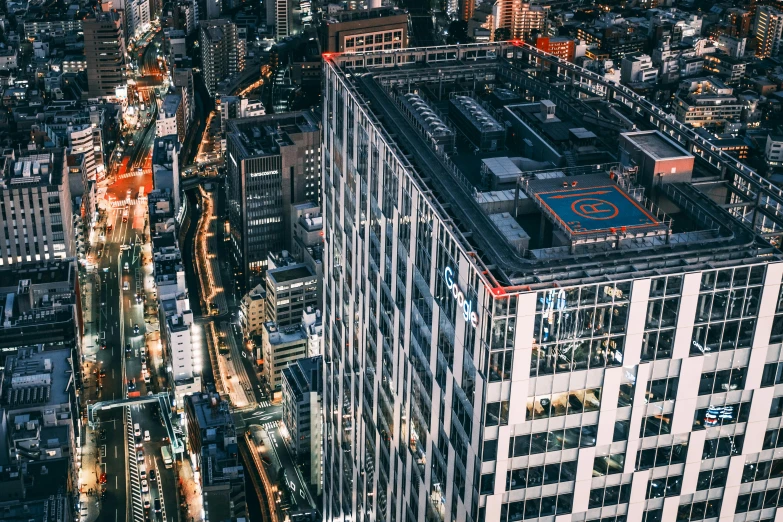 an aerial view of a city at night, unsplash contest winner, sōsaku hanga, at future neon light rooftop, the building is a skyscraper, thumbnail, high detail photo