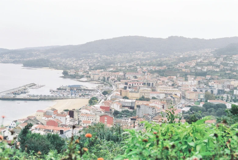 a view of a city from the top of a hill, pexels contest winner, renaissance, traditional corsican, 2 5 6 x 2 5 6 pixels, slight haze, tropical coastal city