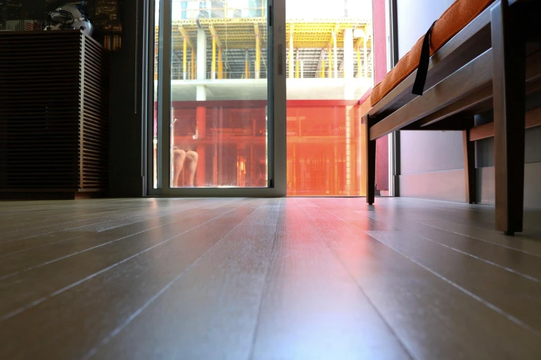 a wooden bench sitting in front of a sliding glass door, pexels contest winner, hyperrealism, mecha floor, sakimichan hdri, straight camera view, capsule hotel