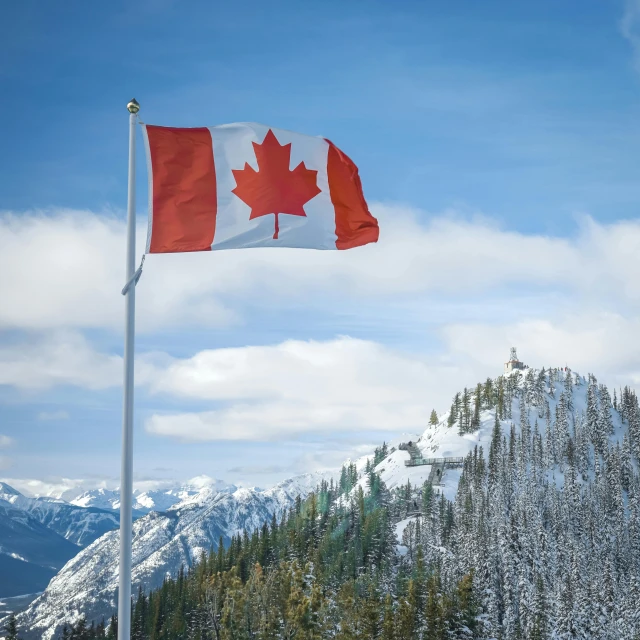 a canadian flag flying on top of a snow covered mountain, by Julia Pishtar, pexels contest winner, symbolism, cannon snow covered trees, avatar image, high angle close up shot, thumbnail