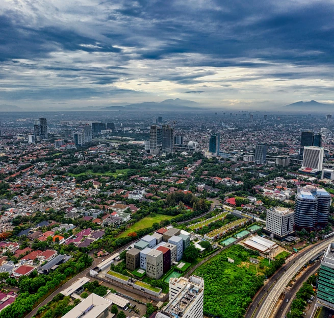 a view of a city from the top of a building, by Basuki Abdullah, pexels contest winner, hyperrealism, square, aerial footage, high quality image