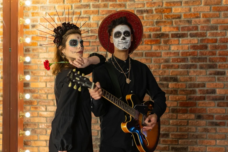 a couple of people that are standing next to each other, pexels contest winner, international gothic, la catrina, guitarists, avatar image