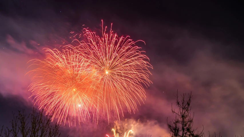 a bunch of fireworks that are in the sky, by Anato Finnstark, pexels contest winner, hurufiyya, coloured photo, thumbnail, 8k 50mm iso 10, seasonal