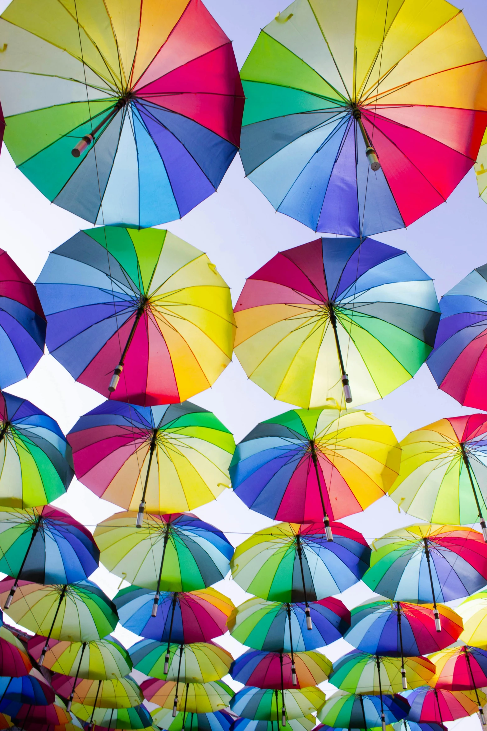 a bunch of colorful umbrellas hanging from the ceiling, a picture, inspired by Jodorowsky, unsplash, color”, vivid)