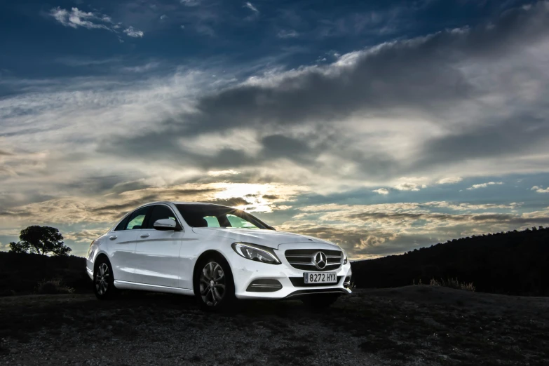 a white mercedes benz benz benz benz benz benz benz benz benz benz benz benz benz benz benz, by Daniel Lieske, pexels contest winner, in a scenic background, avatar image, panoramic photography, dramatic lighting - n 9