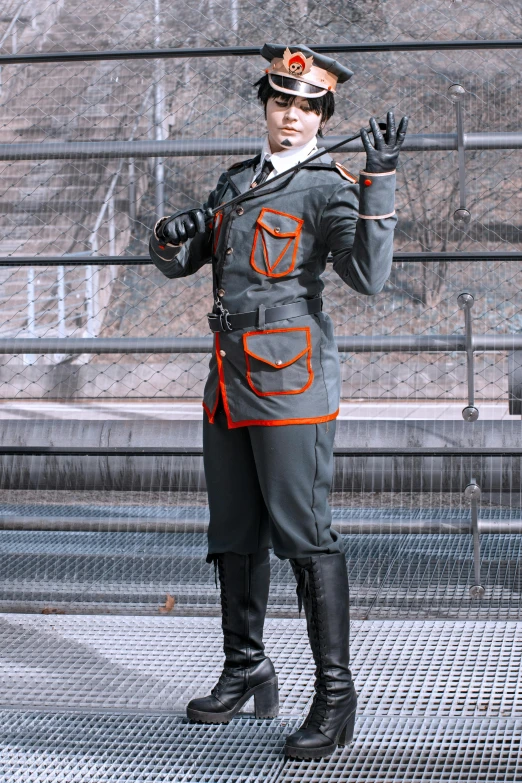 a man in a military uniform posing for a picture, a digital rendering, inspired by Yasutomo Oka, grey orange, full-cosplay, twitch streamer / gamer ludwig, prussia