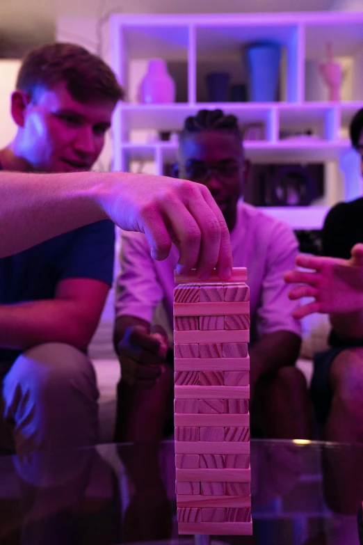 a group of people sitting around a table playing a game, stacked image, chillhop, up close, vine twist