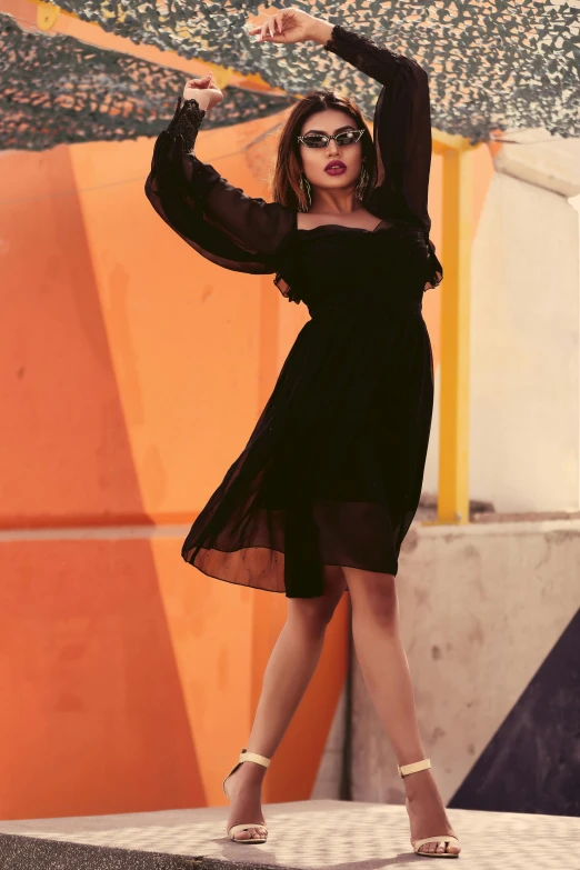 a woman in a black dress holding an umbrella, pexels contest winner, arabesque, isabela moner, full body:: sunny weather::, chiffon, retro stylised